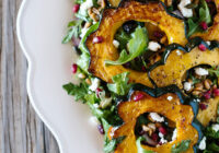 Roasted Acorn Squash Salad with Redifarms Arugula Microgreens, Spicy Pumpkin Seeds, and Cranberries