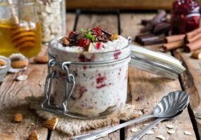 overnight oatmeal in a jar with cherry jam and chocolate